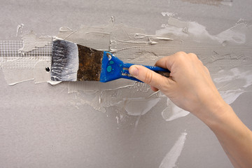 hand coating wall of plaster