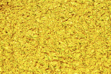 Shiny yellow gold foil abstract texture background