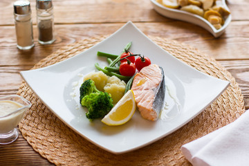 Salmon steak and vegetables. Lenten healthy food.