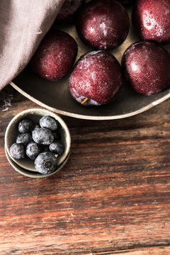 plum with blueberries ripe berries to diet