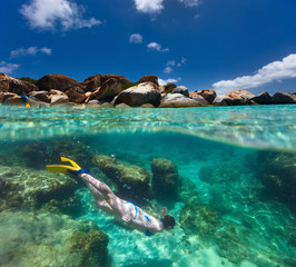 Woman snorkeling at tropical water