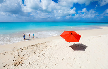 Mother and kids at tropical beach