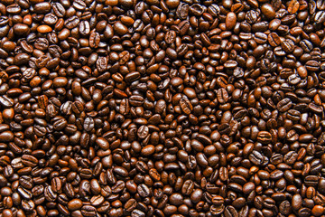 Roasted coffee beans background texture.