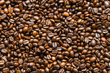 Roasted coffee beans background texture.