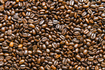Roasted coffee beans background texture.