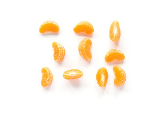 Tangerine segments on white background