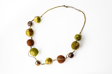 Felt necklace. Handmade stylish felt jewelry isolated on a white background