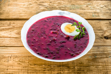 Borscht made with beets with hard boiled egg served with sour cream. Cuisine of eastern and central Europe, especially Russia, Poland, and Ukraine.