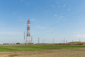 Power distribution tower in countryside