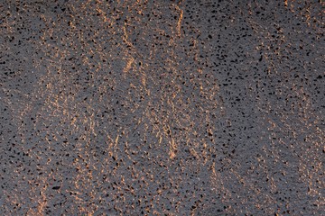 Texture of sunlit concrete floor
