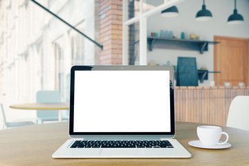 Fototapeta premium White laptop screen and coffee