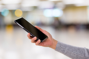 Woman holding cellphone