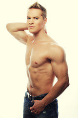 Healthy muscular young man. 