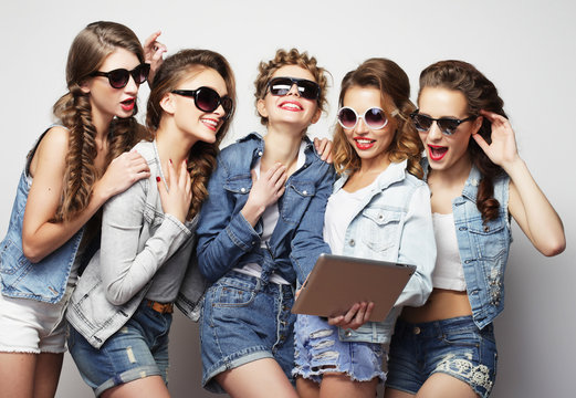  five hipster girls friends taking selfie with digital tablet