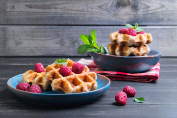 Belgian lush round waffles with fresh raspberries