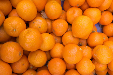 fresh mandarin oranges on market.  oranges fresh fruit.  clement