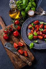 Fototapeta na wymiar Simple and healthy dish, tomato and basil