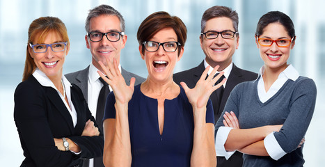 Group of business people wearing eyeglasses.