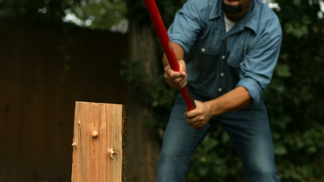 Man chopping wood, super slow motion