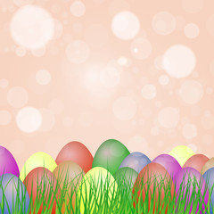 Easter eggs of different colors on the grass.