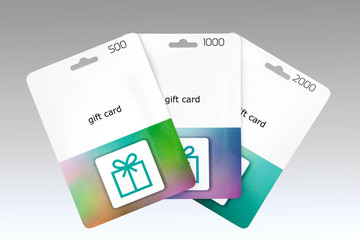 Three gift cards, folded like a fan