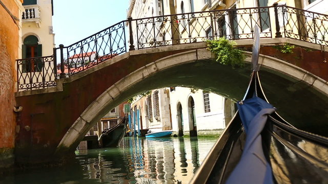 View from gondola during the ride through the canals of Venice, Italy