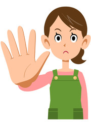 拒否するエプロンを着用した女性