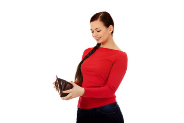 Naklejka premium Happy beautiful student woman holding wallet