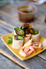 Fresh spring rolls, vegetables wrapped in dough with crab