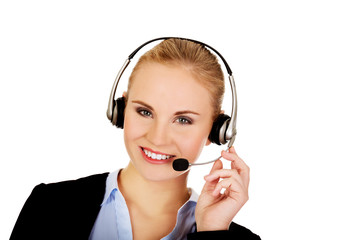 Smiling phone operator in headphones