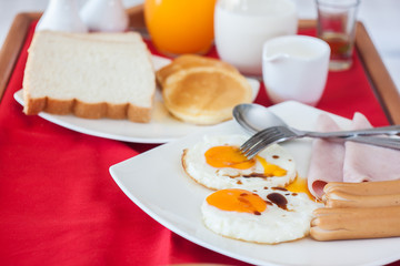 Breakfast set in wooden tray