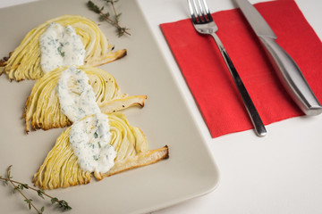 Cabbage baked on a grill with cream sauce