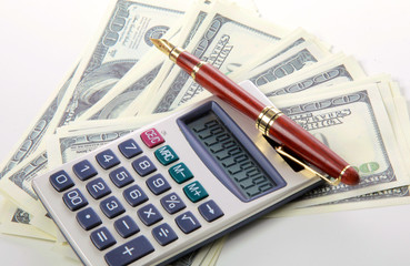 Business Charts with calculator, dollars money and pen on white background