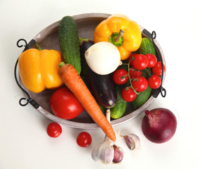 Fresh autumn vegetables on a white background