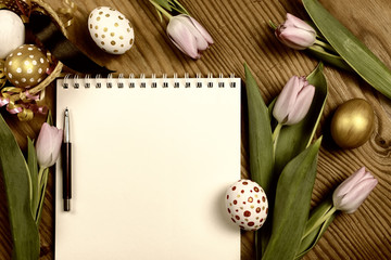 Toned background easter tulips and eggs