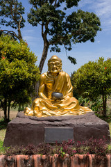 fat monk statue in complex Pagoda Ekayana