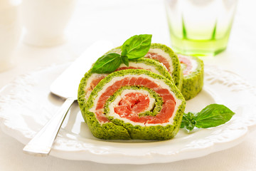 Roll salted salmon, cream cheese and spinach.