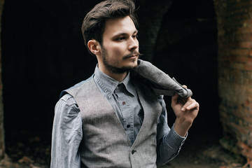 Portrait Elegant bearded
vintage retro young handsome Businessman man hipster, Outdoor, jacker