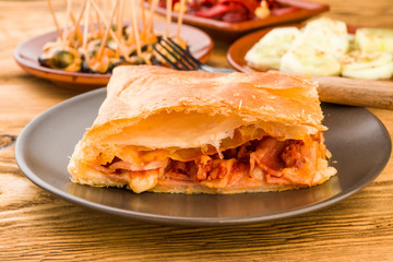 serving homemade puff pastry pie