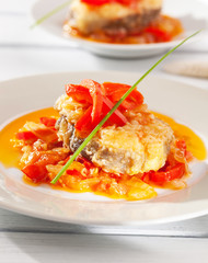 Conger with bell pepper and onions