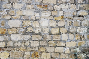 photo of a wall from white stone, stylized antique