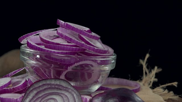 Rotating Red Onion Rings as seamless loopable 4K UHD footage