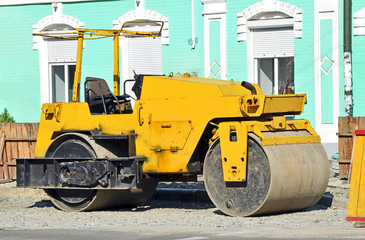 Yellow asphalt paver