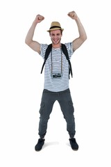 Handsome man raising arms