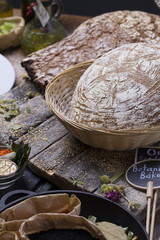 Round ( homemade ) bread over rustic background