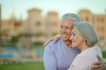 Fototapeta premium Senior couple near hotel resort