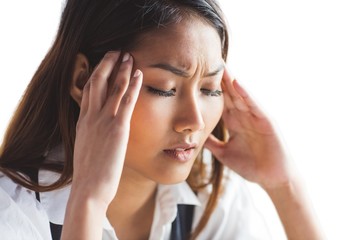 Nervous businesswoman holding her head