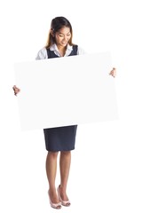 Smiling businesswoman holding a white poster
