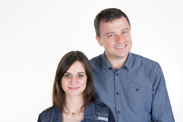 Man and his teenage daughter standing