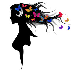 The beautiful girl with dispelled hair and butterflies. Spring time symbol